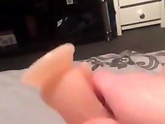 Masterbating with suction cup dildo